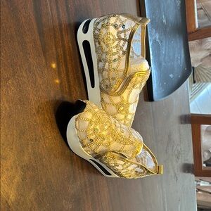 Gold and White Sneakers with a Shimmering Design